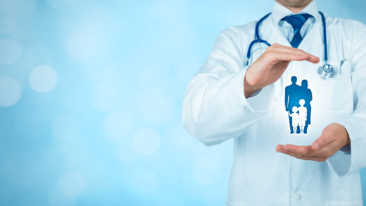 Doctor in lab coat with blue background